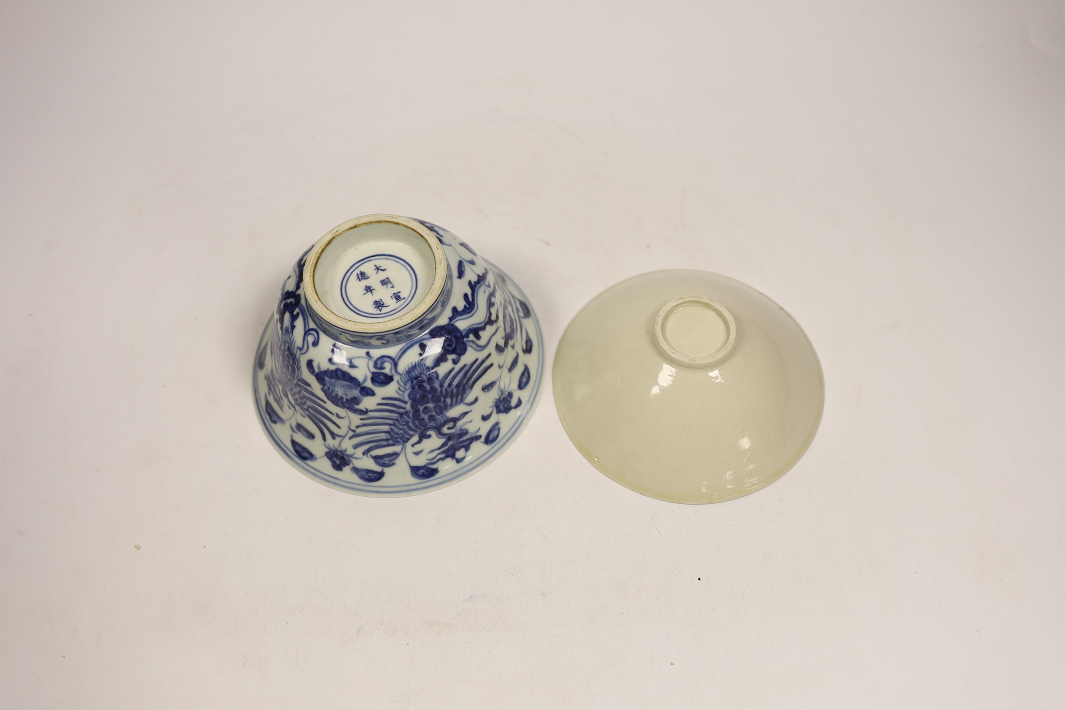 A Chinese blue and white porcelain bowl, Xuande mark but later and another bowl